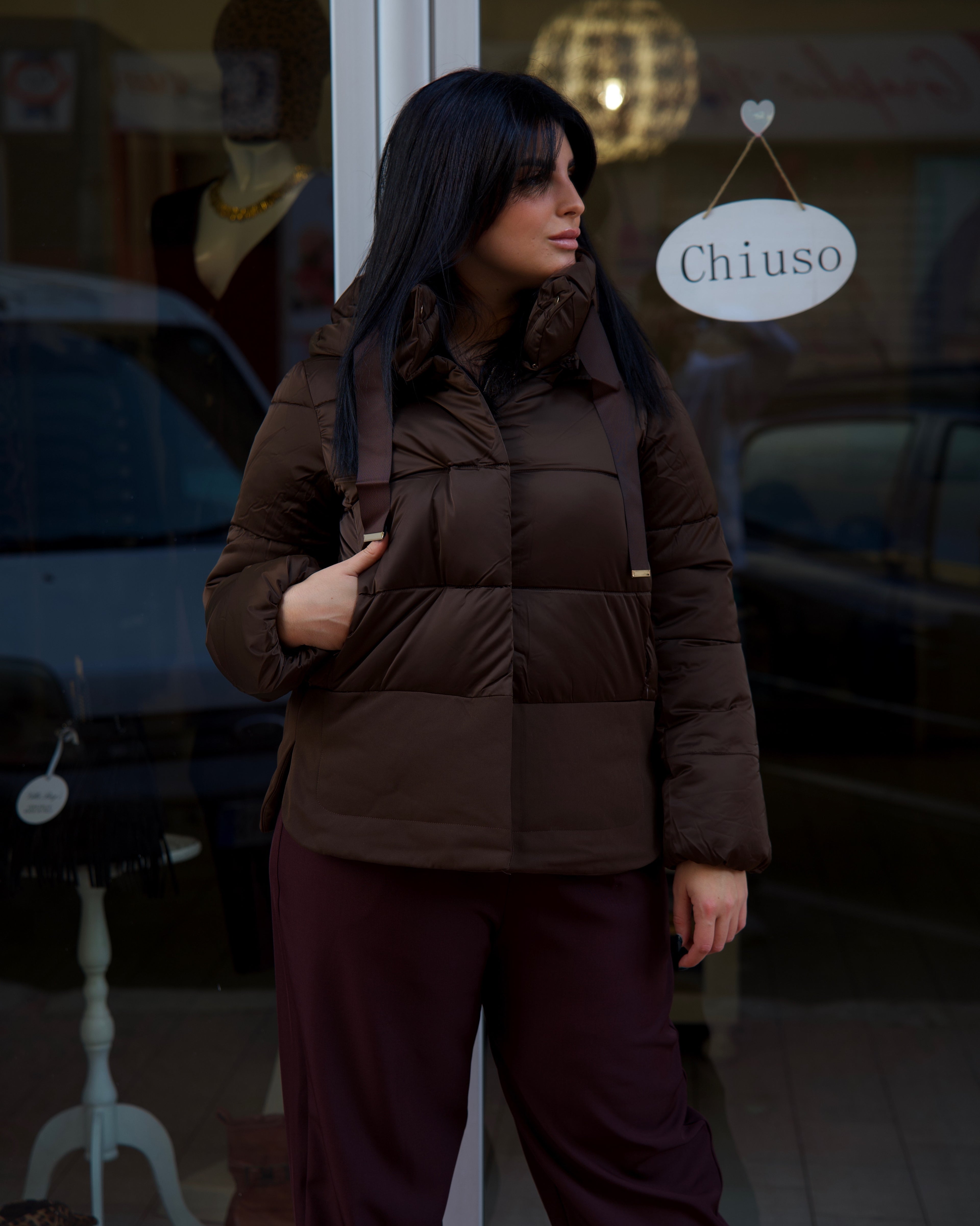 Piumino marrone con cappuccio